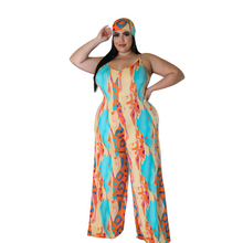 Load image into Gallery viewer, Abstract JumpsuitAbstract JumpsuitSandiyah&#39;s Closet This jumpsuit is a true embodiment of fashion and comfort, perfect for those who want to make a statement while feeling at ease.
 The colorful abstract pattern is a