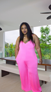 Pink Palazzo JumpsuitPink Palazzo JumpsuitSandiyah's ClosetGet vacation ready with this this beautiful neon pink palazzo jumpsuit. It features spaghetti straps and side pockets and is also a very lightweight, stretchy and so