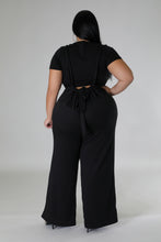 Load image into Gallery viewer, Sequoiya Overall JumpsuitSequoiyaSandiyah&#39;s Closet 

Stretch overalls
High-waisted
Self-tie
Wide-leg
Inseam is 32 inches
65% Polyester
31% Rayon
4% Spandex
Can also be styled as pants
Hand wash cold
Model is wearing