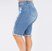 Load image into Gallery viewer, Distressed Denim Bermuda ShortsDistressed Denim Bermuda ShortsSandiyah&#39;s ClosetUpgrade your summer style with our Distressed Denim Bermuda Shorts. Made from premium quality denim, these shorts offer a comfortable fit and a trendy distressed fin